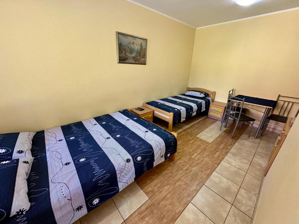 Una cama o camas en una habitación de Divčibarski raj