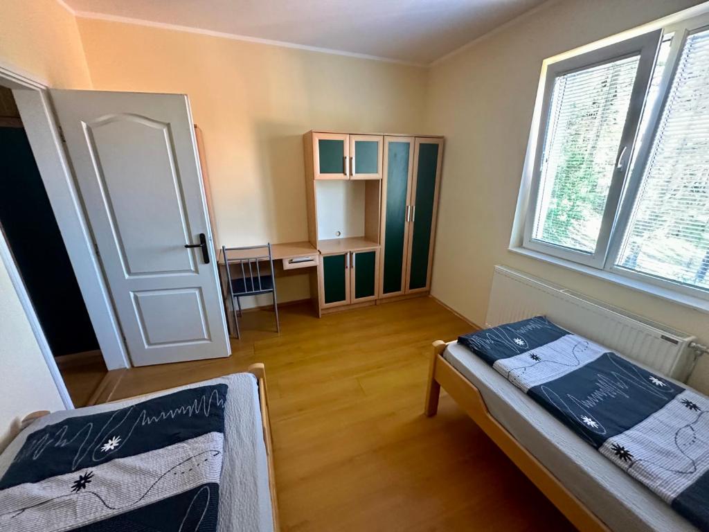 Una cama o camas en una habitación de Divčibarski raj