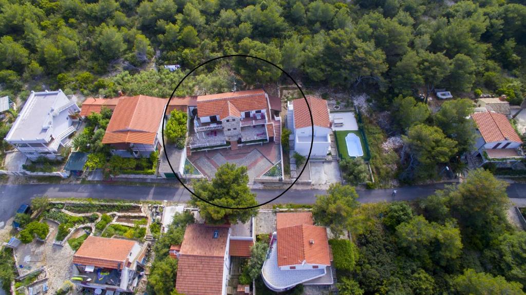 an overhead view of a house in a subdivision at The Sea House Apartments in Vis