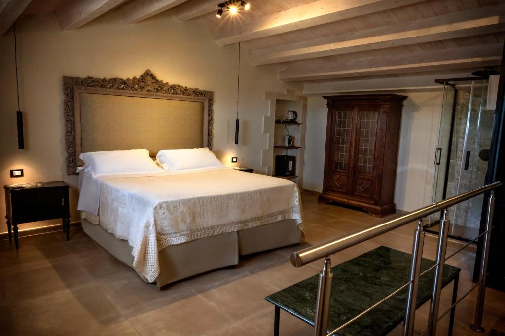 Postel nebo postele na pokoji v ubytování Aria Rooms and Terrace