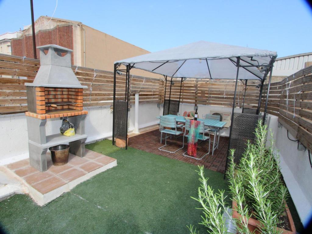 Patio nebo venkovní prostory v ubytování Vacaciones ideales: cerca del mar, wifi gratis, aire opcional, mascotas y playa para perros - ES-184-48