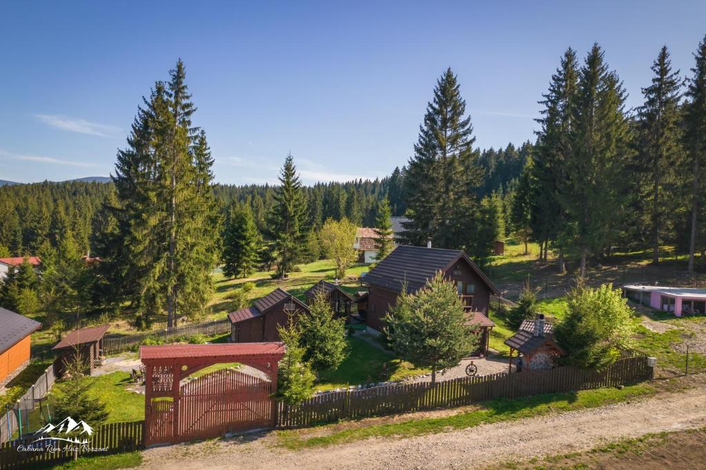 an aerial view of a house with a fence at Rum Haz in Borzont