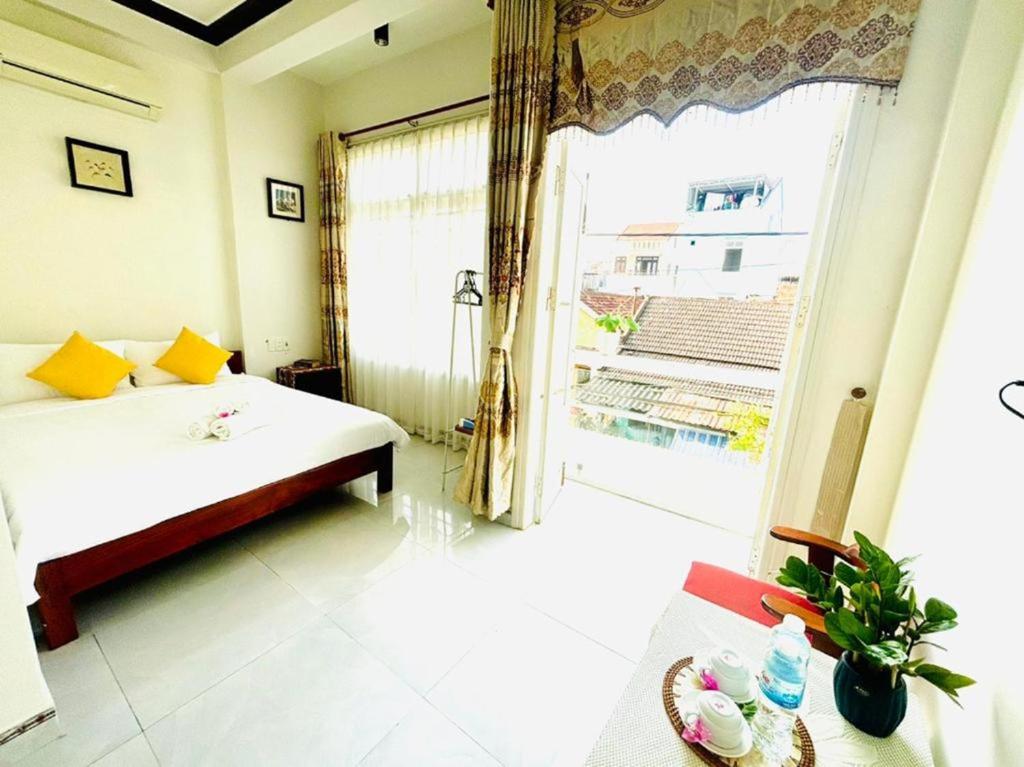 Giường trong phòng chung tại Good Morning Hoi An Homestay and Hostel