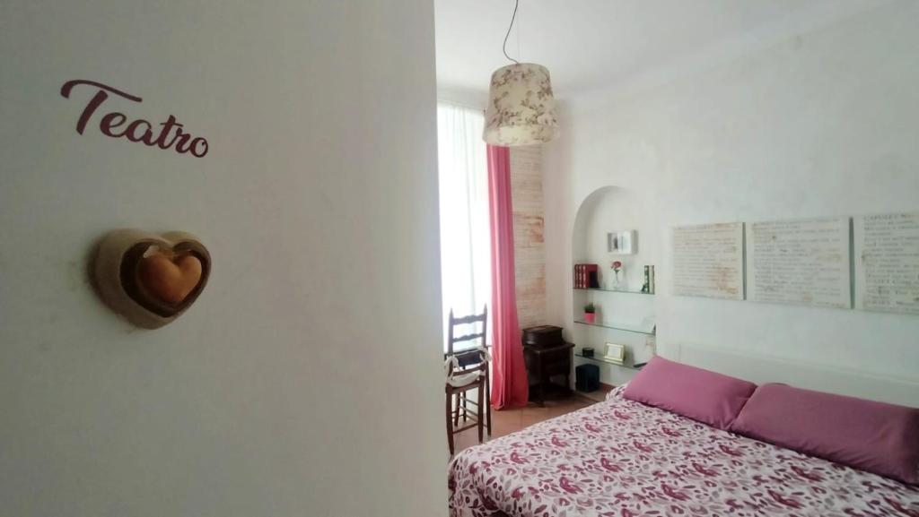 Postel nebo postele na pokoji v ubytování B&B La Casa in Centro