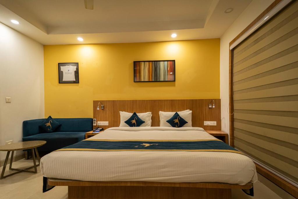 Postel nebo postele na pokoji v ubytování Sparrow Hotel Managed by Siara Sariska Alwar