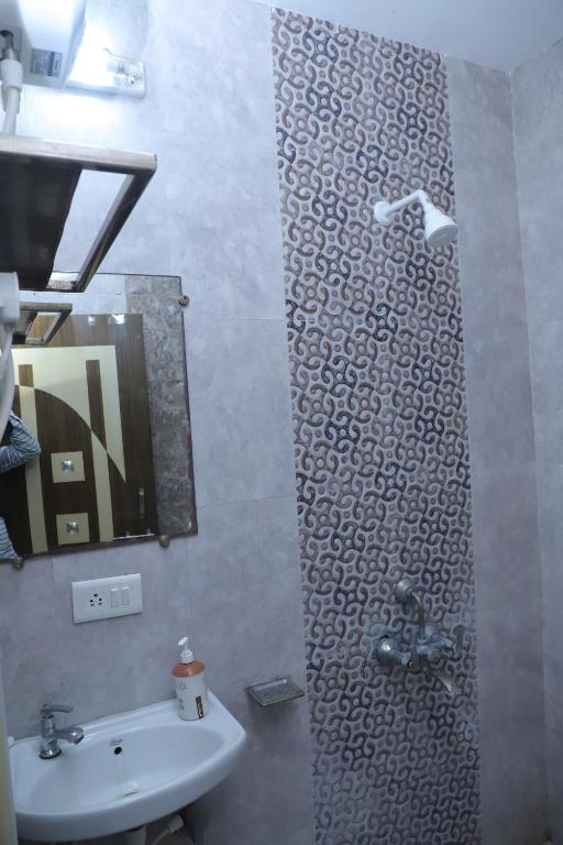 Koupelna v ubytování Hotel Sai Kohinoor