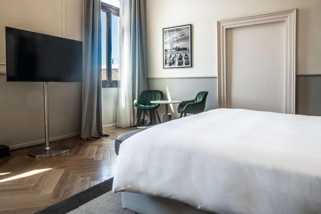 Televiisor ja/või meelelahutuskeskus majutusasutuses Radisson Collection Hotel, Palazzo Nani Venice