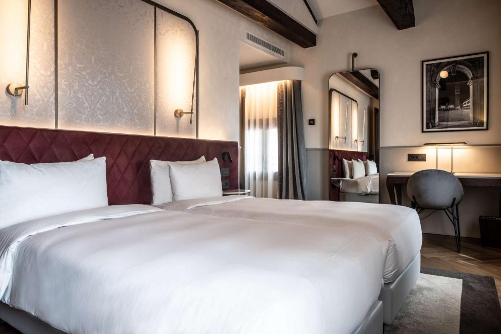 Voodi või voodid majutusasutuse Radisson Collection Hotel, Palazzo Nani Venice toas