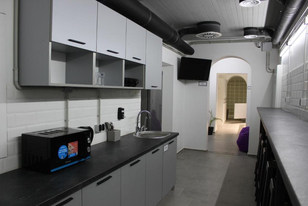 Kuchyň nebo kuchyňský kout v ubytování AV-3 capsule hotel