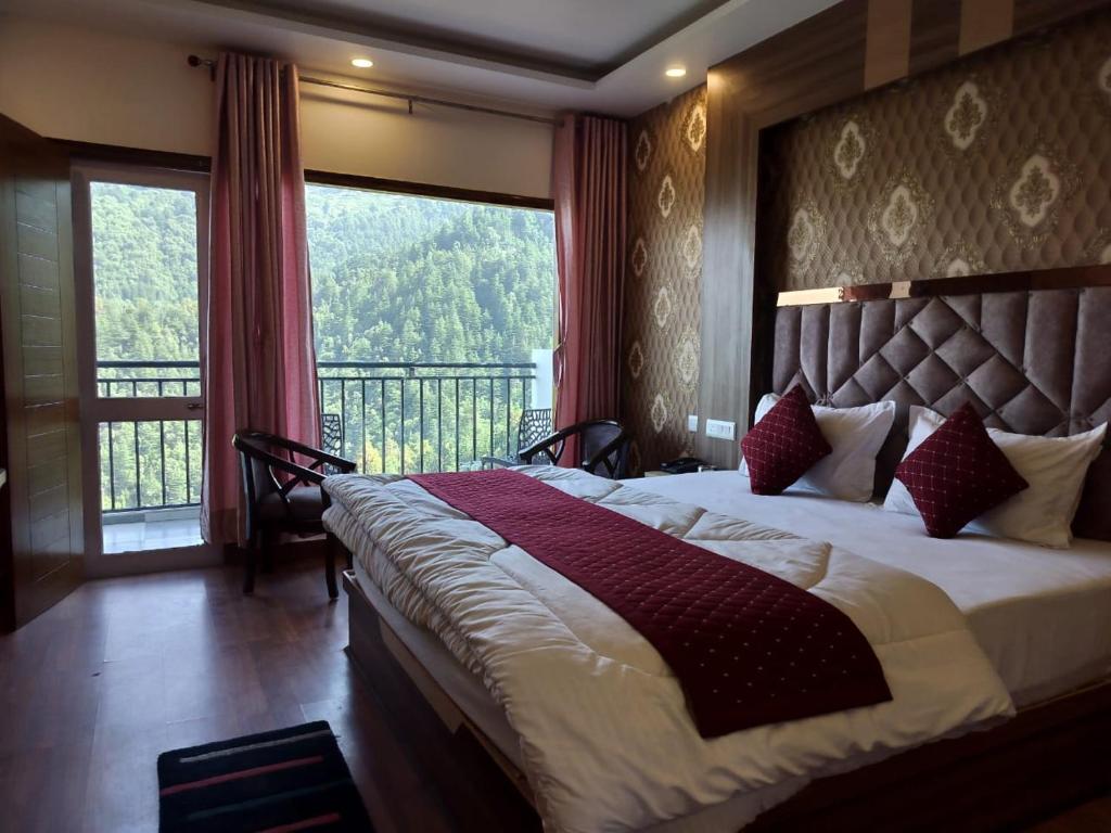 Postel nebo postele na pokoji v ubytování Summer Hill Resort