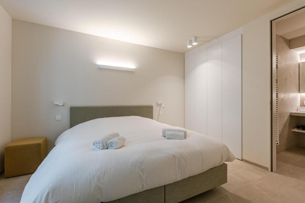 Postel nebo postele na pokoji v ubytování Flat Leon