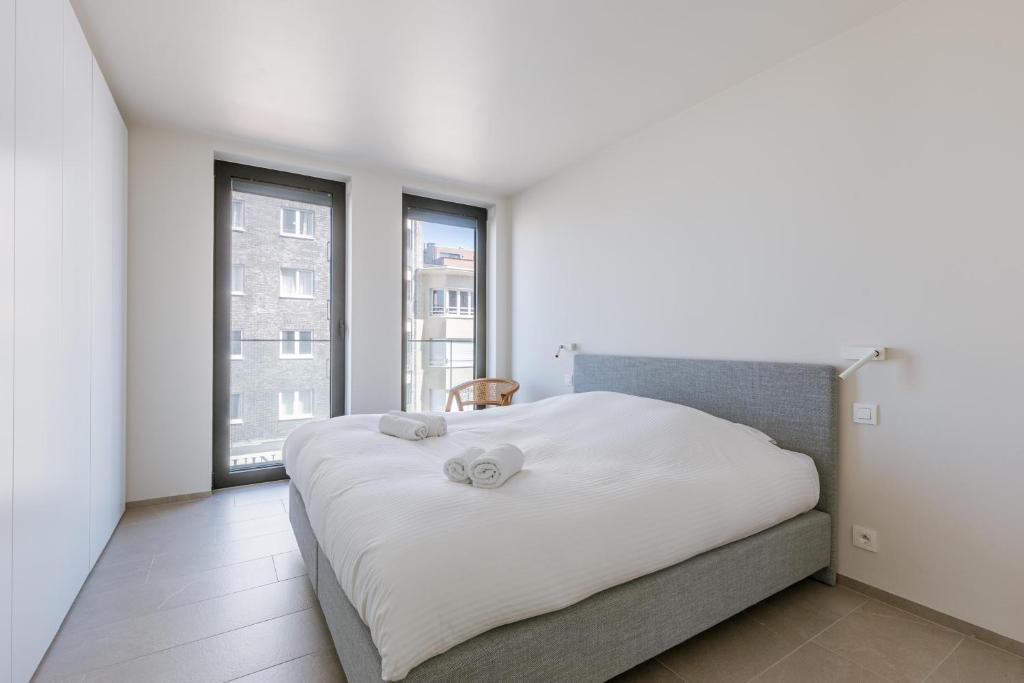 Postel nebo postele na pokoji v ubytování Flat Leon