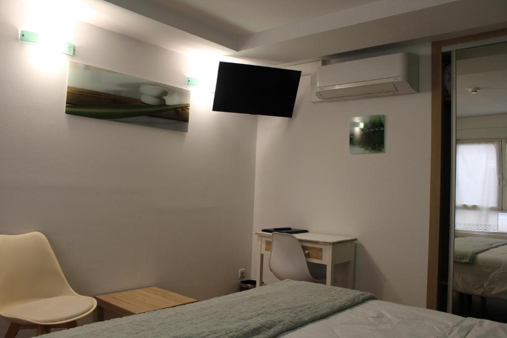TV a/nebo společenská místnost v ubytování Pension Joakina