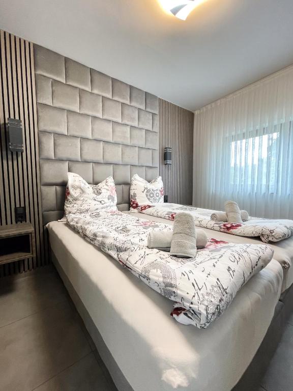 Postel nebo postele na pokoji v ubytování Hotel Löwenstein
