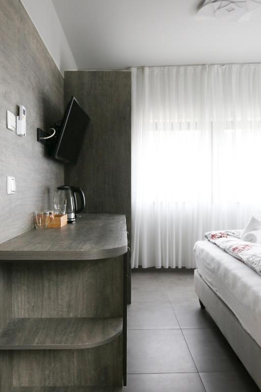 Postel nebo postele na pokoji v ubytování Hotel Löwenstein