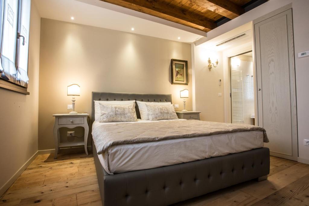 Posteľ alebo postele v izbe v ubytovaní Casa Delneri Boutique Hotel Adults Only