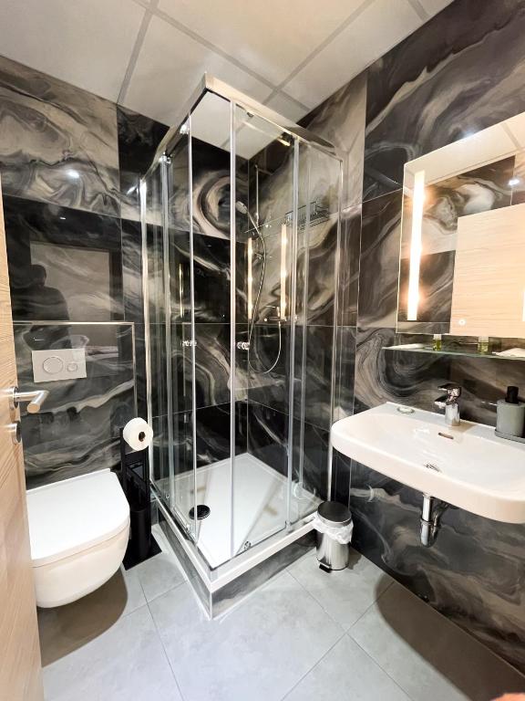 Koupelna v ubytování Hotel Löwenstein