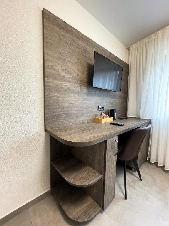TV a/nebo společenská místnost v ubytování Hotel Löwenstein