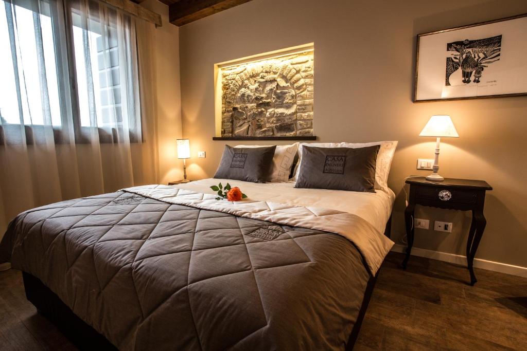 Posteľ alebo postele v izbe v ubytovaní Casa Delneri Boutique Hotel Adults Only