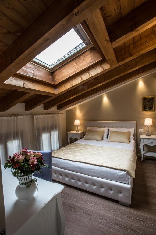 Posteľ alebo postele v izbe v ubytovaní Casa Delneri Boutique Hotel Adults Only