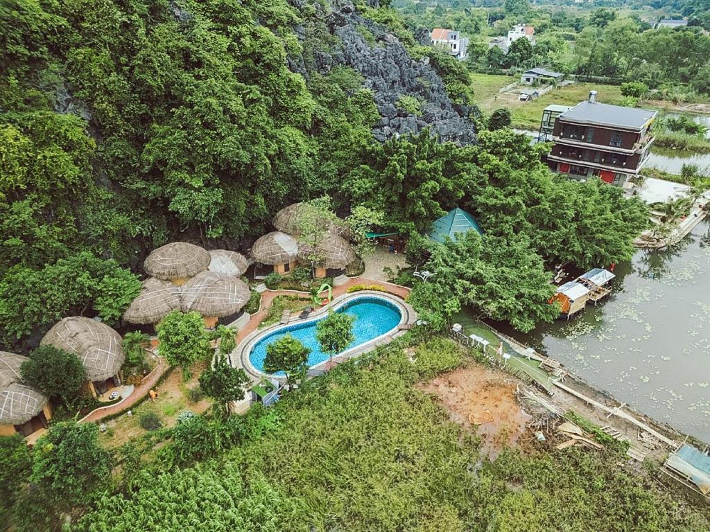 an aerial view of a resort with a swimming pool at Trang An Legend in Ninh Binh