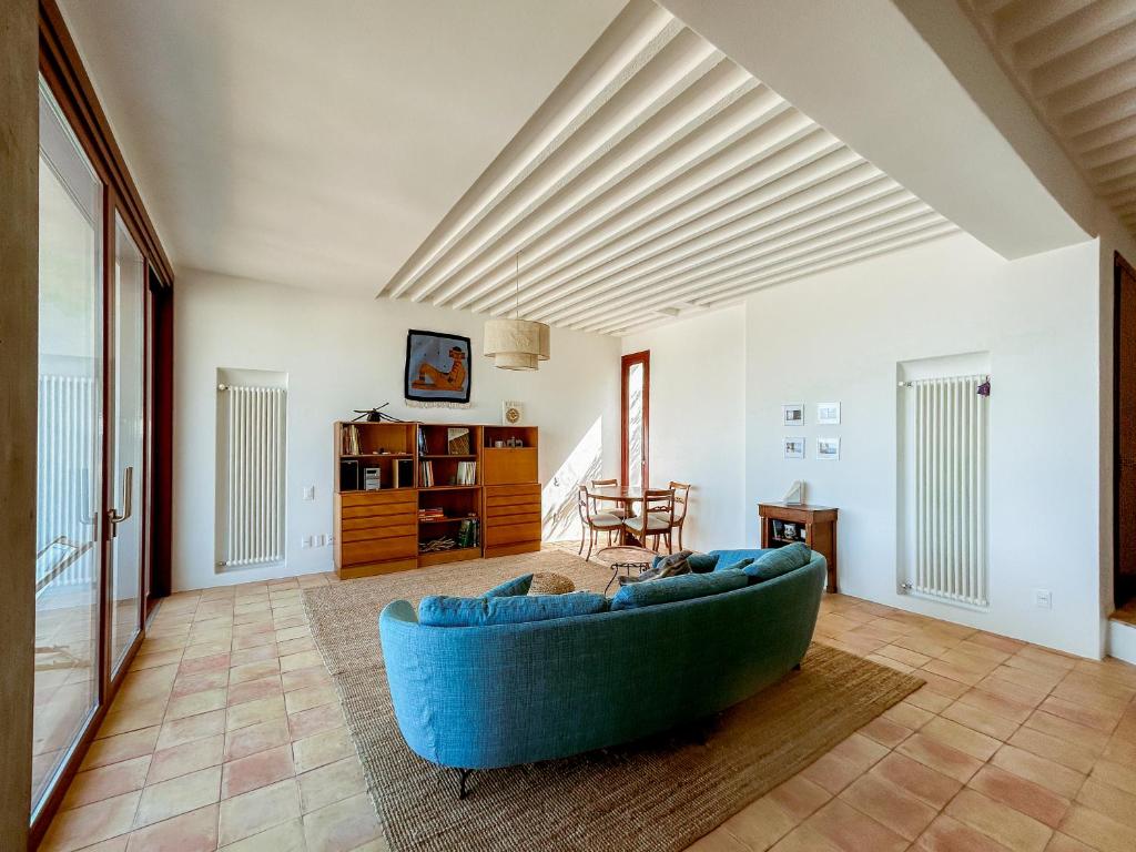 TV a/nebo společenská místnost v ubytování Villa Ghezzi Sea View