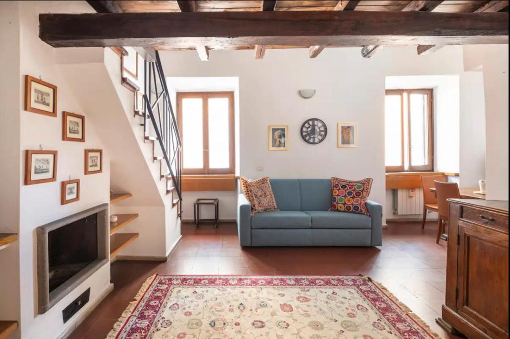Et opholdsområde på Accogliente casa al Pantheon