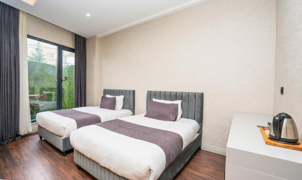 216 Station Suite Gebze - Superior Vierpersoonskamer