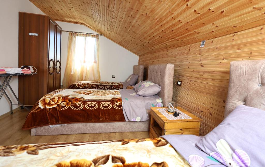 Postel nebo postele na pokoji v ubytování Samuela Cozy Retreat