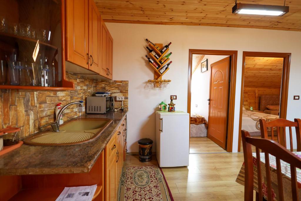 Kuchyň nebo kuchyňský kout v ubytování Samuela Cozy Retreat