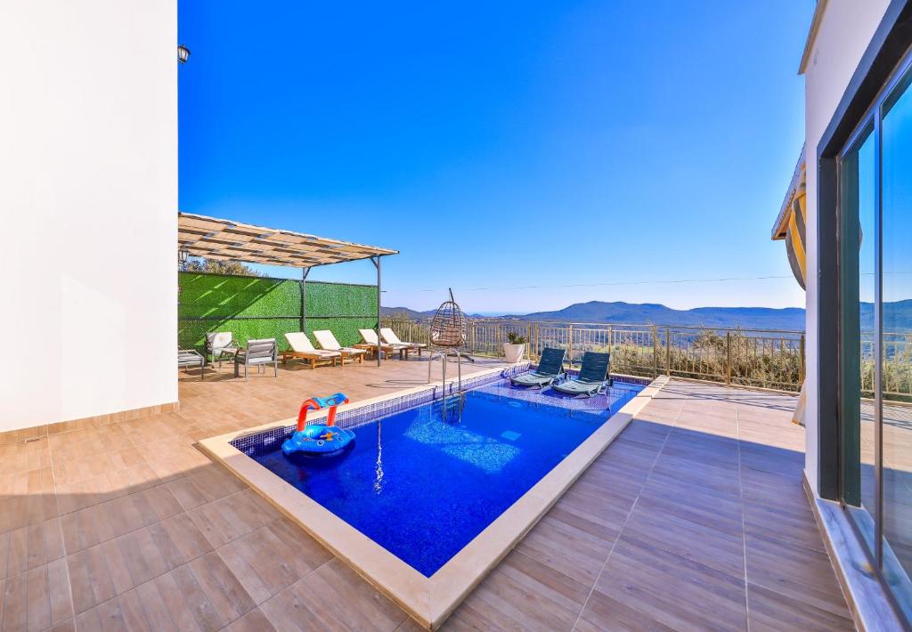 Bazén v ubytování Villa Ases Çukurbağ Köyü Kaş Antalya nebo v jeho okolí