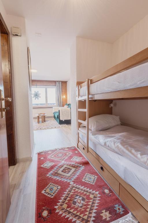 Postel nebo postele na pokoji v ubytování Chaleureux studio proche des pistes de ski