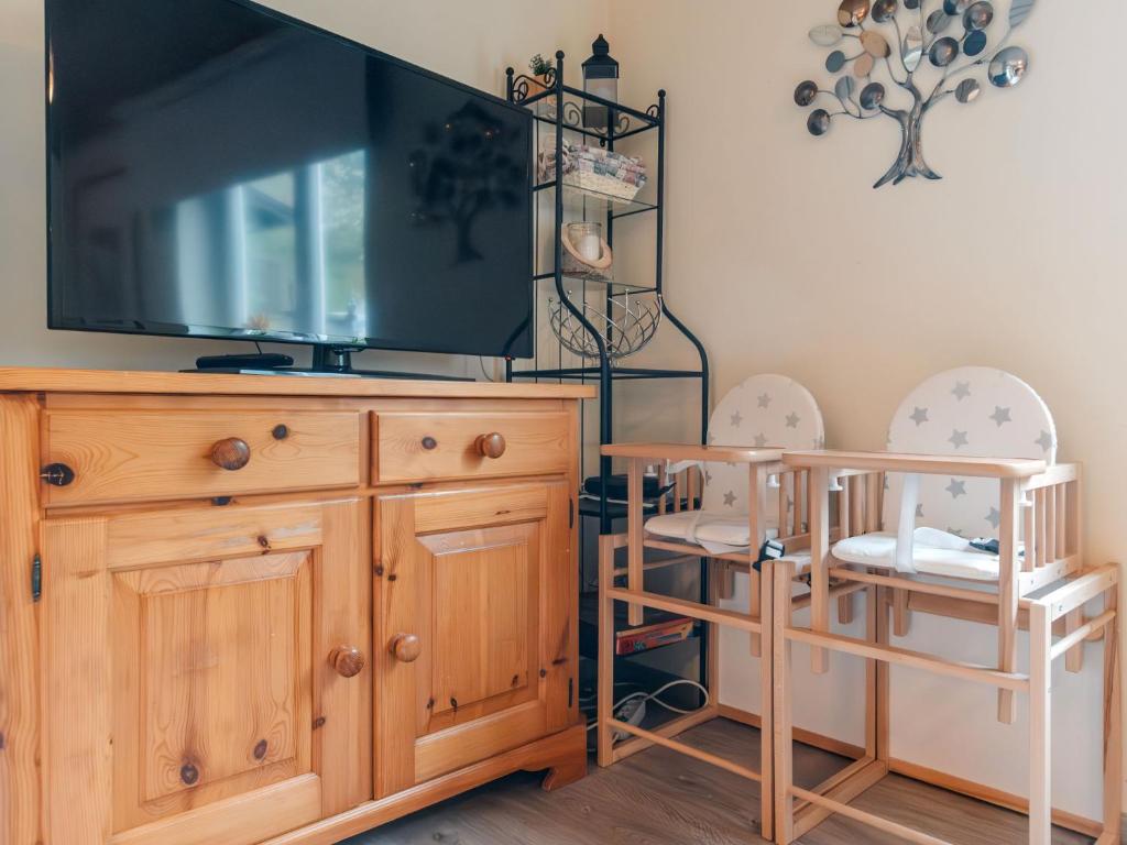 TV a/nebo společenská místnost v ubytování Holiday Home Bergfried by Interhome