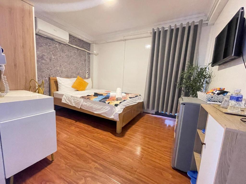 Posteľ alebo postele v izbe v ubytovaní Jasmine Hotel