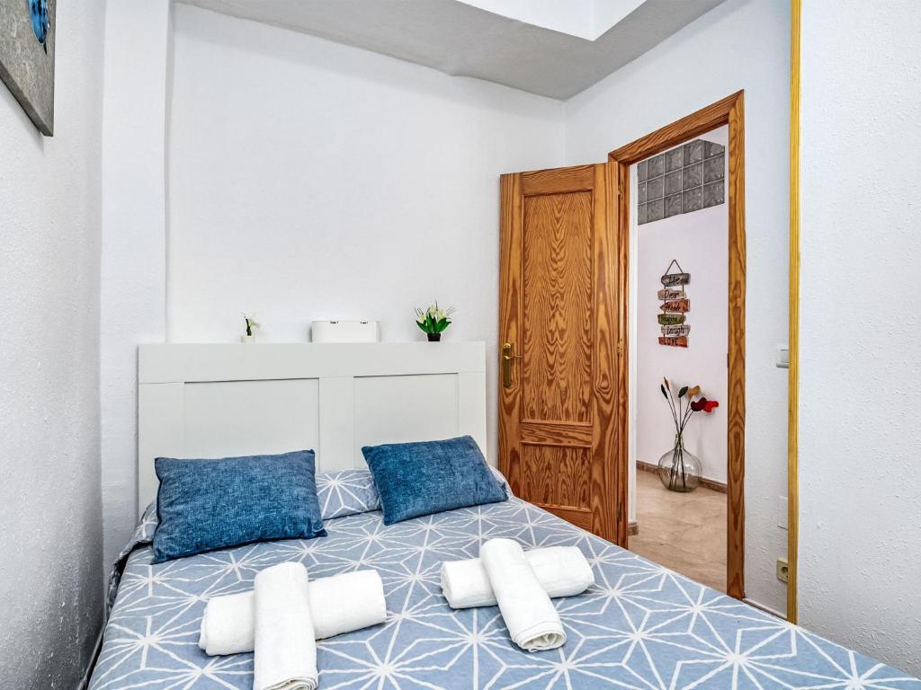 Postel nebo postele na pokoji v ubytování Apartment Benasol-1 by Interhome