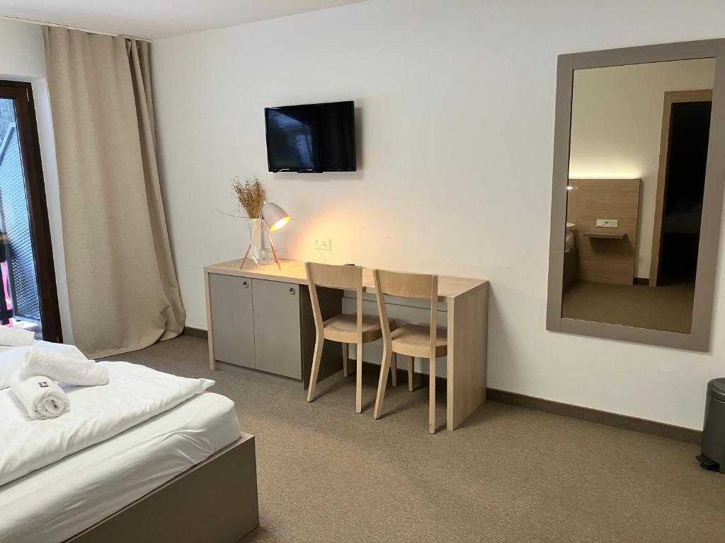 Postel nebo postele na pokoji v ubytování Hotel Stubnerhof