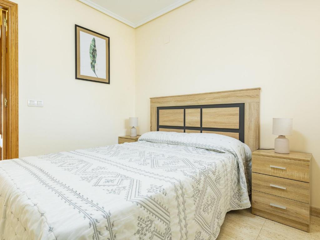 A bed or beds in a room at Apartment Grimaca-2 by Interhome