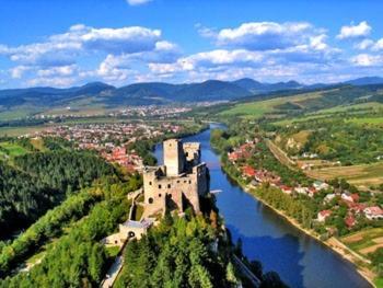 an aerial view of a castle on a river at Privát SIMBA in Strečno