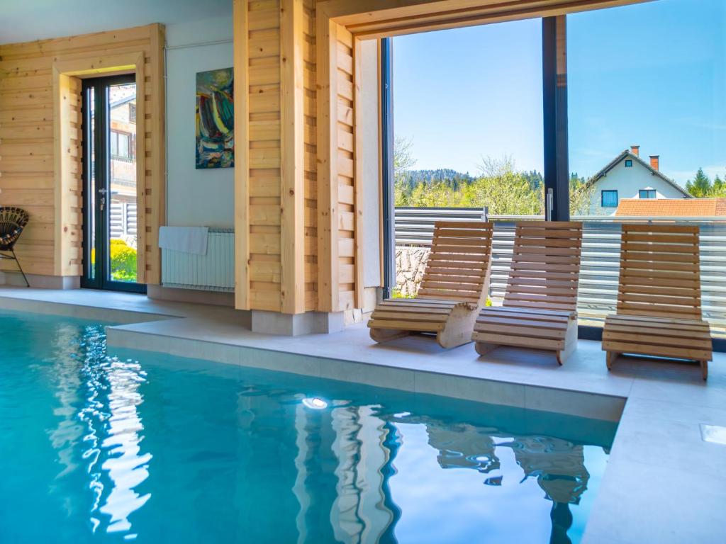 Bazén v ubytování Holiday Home Relax & Play by Interhome nebo v jeho okolí