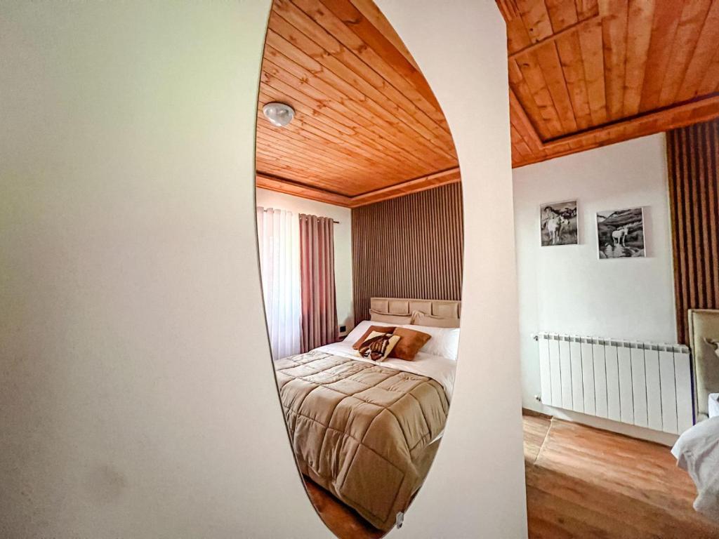 Letto o letti in una camera di Logu i Harushave