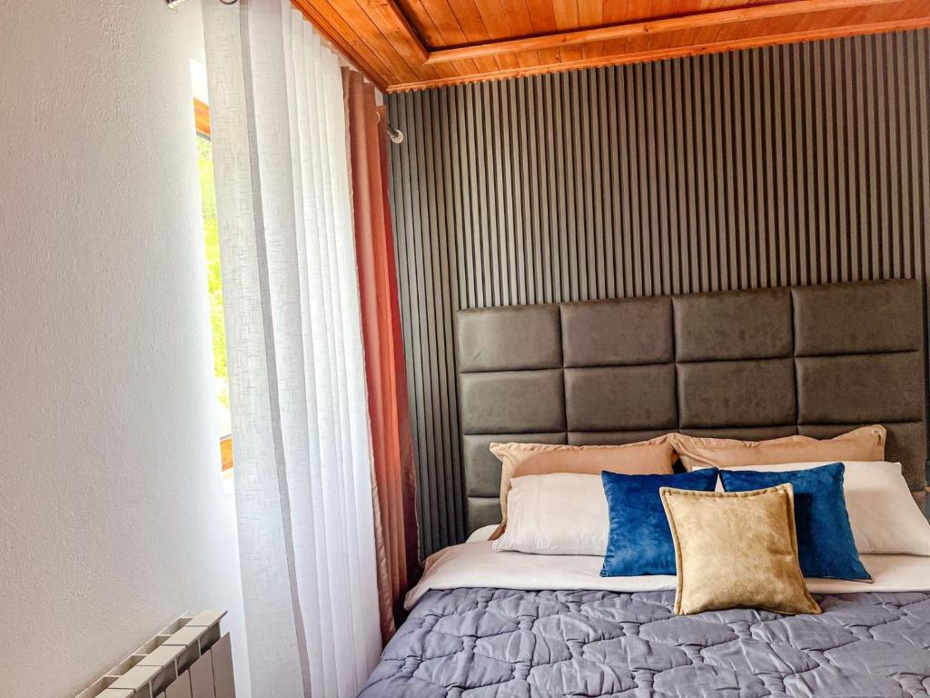 Letto o letti in una camera di Logu i Harushave