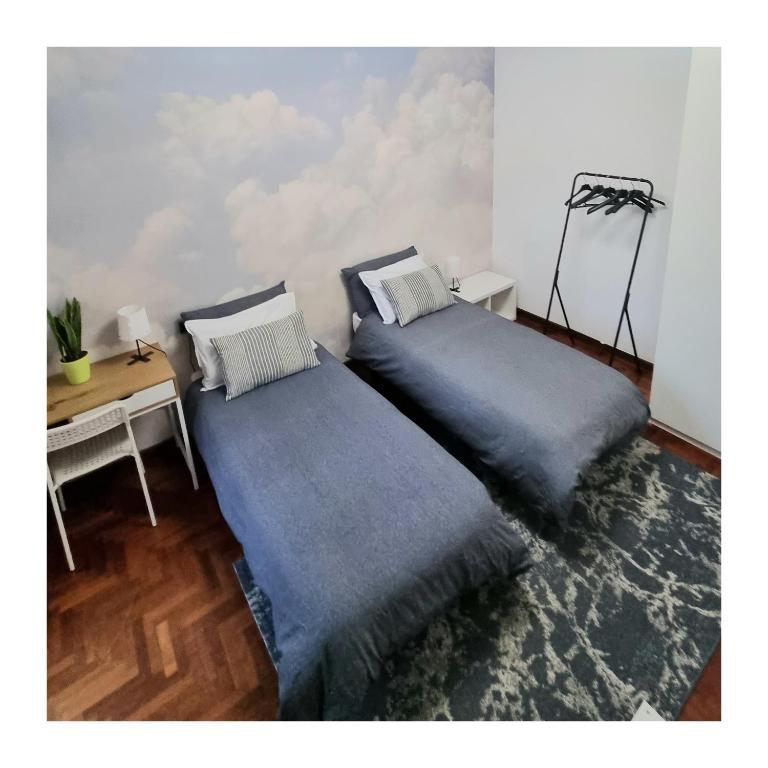 Postel nebo postele na pokoji v ubytování Orio Welcome