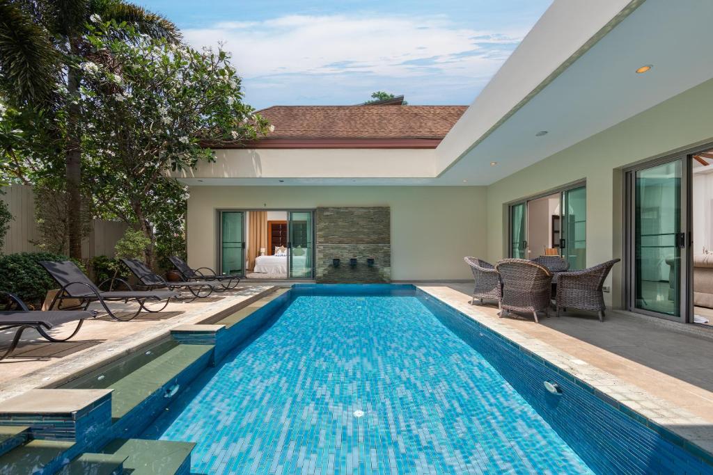 an image of a swimming pool in a house at VILLA BOND| 3 Bedrooms | Private Pool | 3 min to Naiharn Beach in Rawai Beach