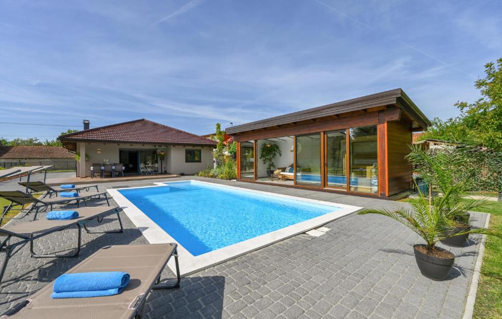 an image of a swimming pool in a house at Gorgeous Home In Puscine With Sauna in Varaždin