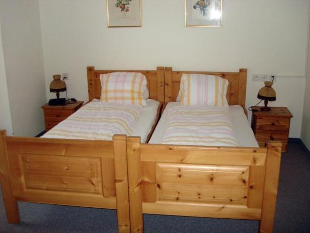 Postel nebo postele na pokoji v ubytování Hotel Quellenhof