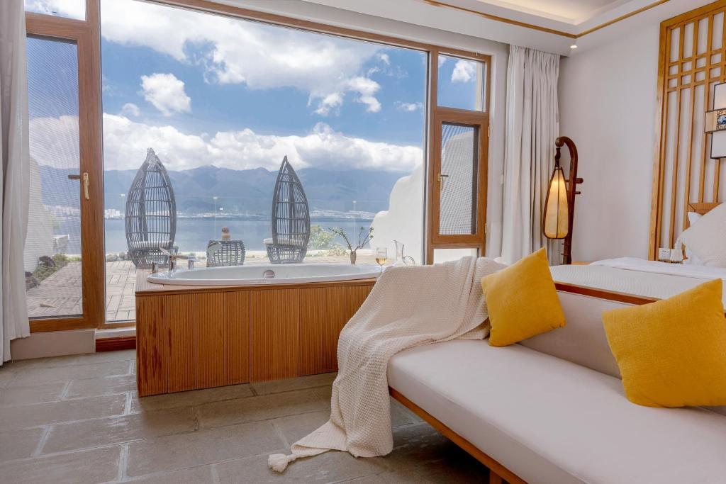 Posezení v ubytování Dali Dare Sea View Gueshouse