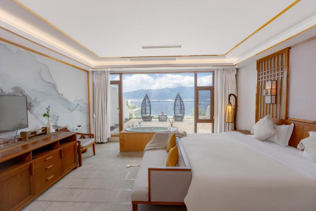 Postel nebo postele na pokoji v ubytování Dali Dare Sea View Gueshouse
