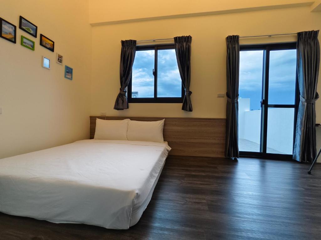 Postel nebo postele na pokoji v ubytování Little Butler B&B
