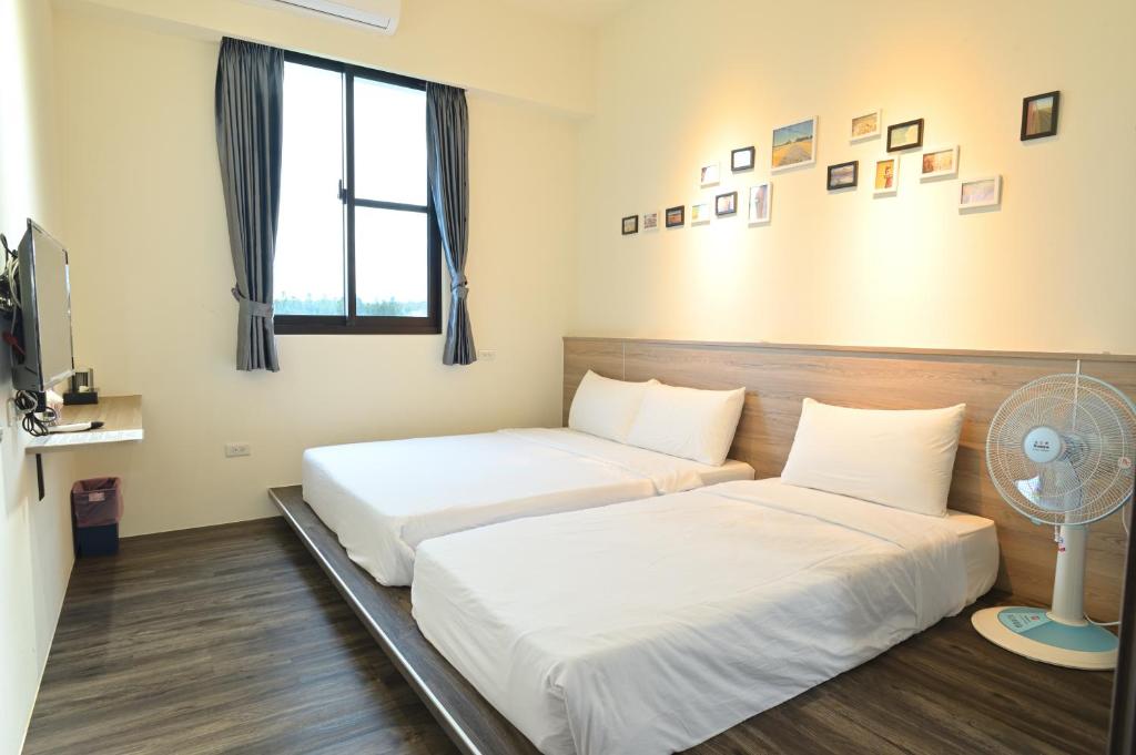 Postel nebo postele na pokoji v ubytování Little Butler B&B