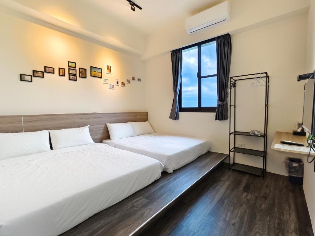Postel nebo postele na pokoji v ubytování Little Butler B&B